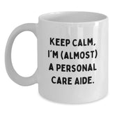 Gifts from Friends for Personal Care Aide - Keep Calm I'm (almost) A Personal Care Aide, Funny White Coffee Mug, Birthday Unique Gifts, Personal Care Aide Humor - Main